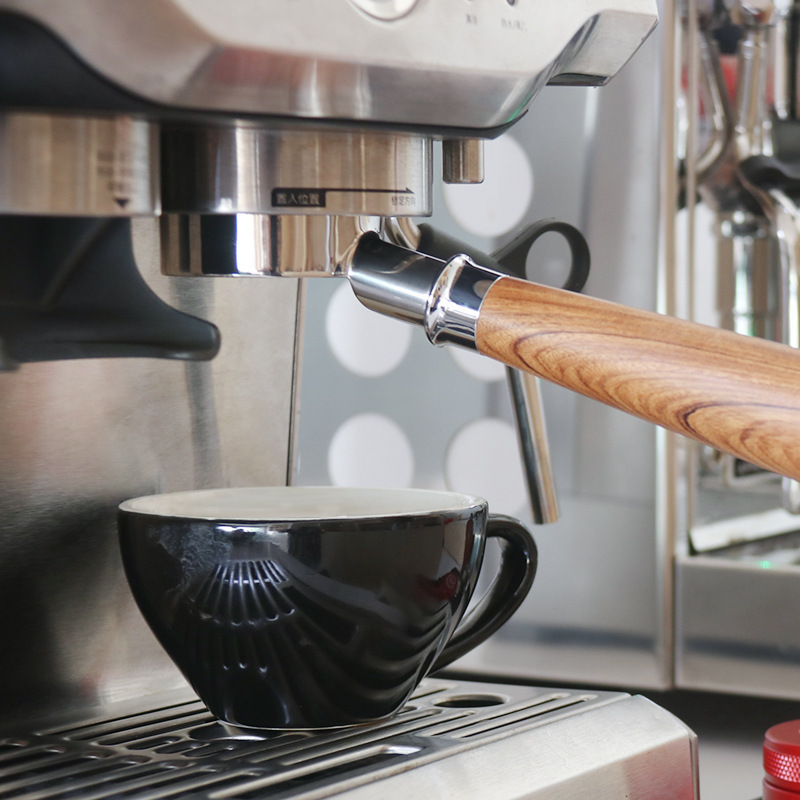 The coffee machine has no handle. 54mm of stainless steel has no handle.