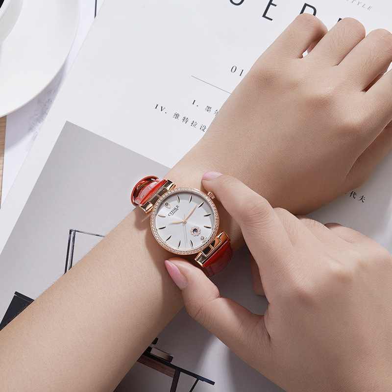 Waterproof leather belts for a girl with a brand name on her watch.