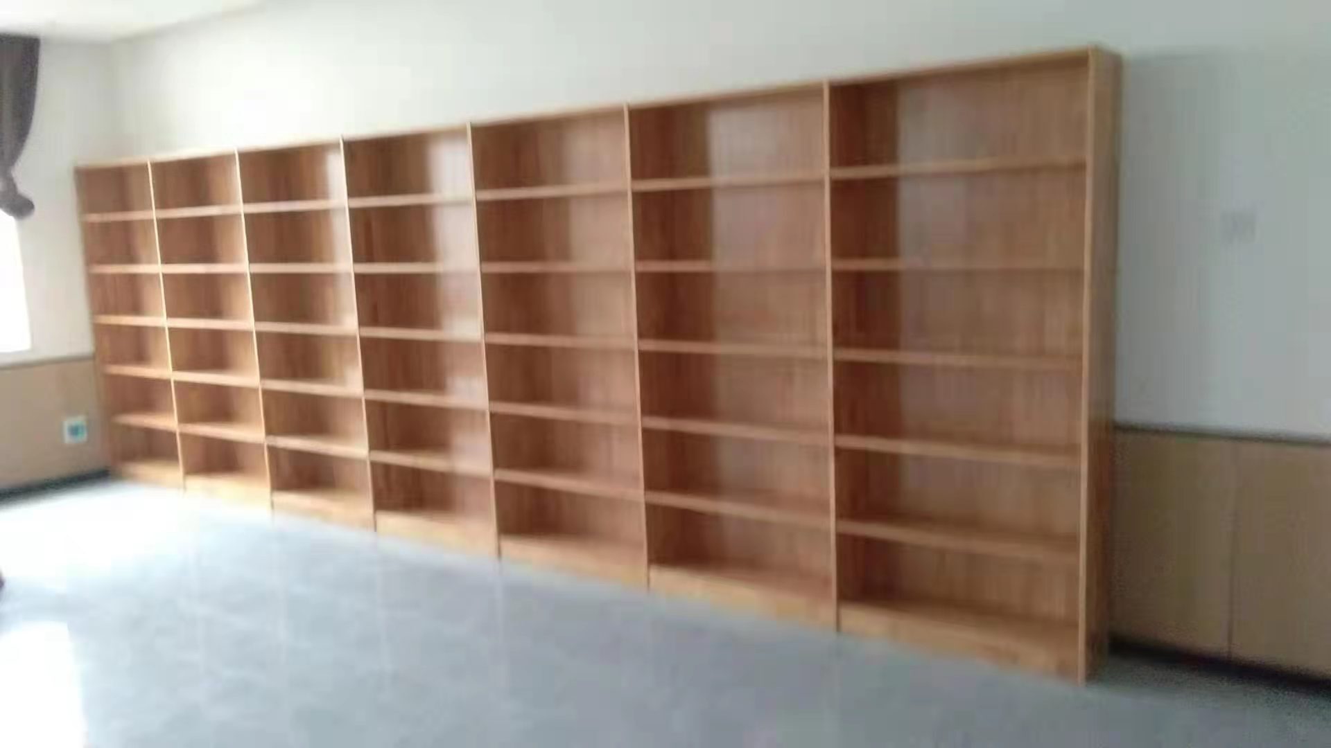 A bid will be made by the owner of the Oakwood Bookwall Bookcase Honorary Wall.