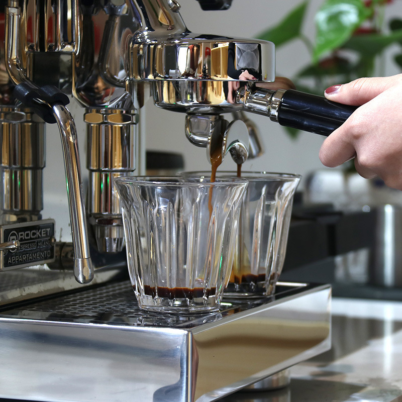 The espresso has no bottom handle, the coffee kit is stainless steel with a bottom handle of 58mm.