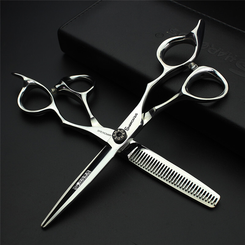 A 6-inch hairdresser with a cutter and a thin cutter for 440 C steel.