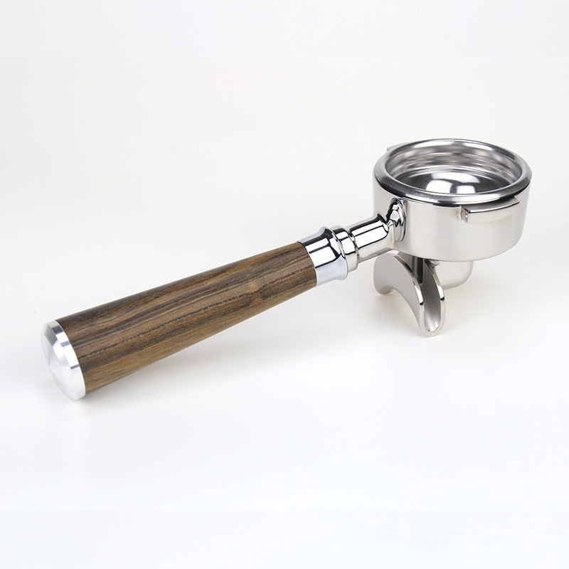 The espresso has no bottom handle, the coffee kit is stainless steel with a bottom handle of 58mm.