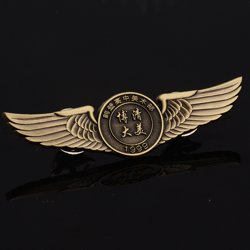 The metal badge is customised to paint a smiley face and make the company's school badge to be an empty chest badge pin.