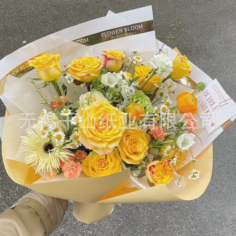 Wholesale of seven-event flower wrapping paper for customised printing of single paper with gold and silver beam wrapping