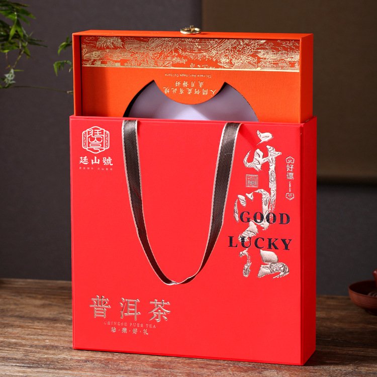 A commercial gift for Pummi's emptiness box, a 357g general tea box full of singles.