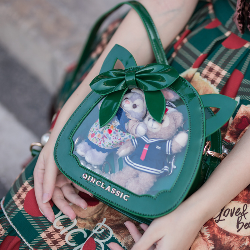 The original Lolita women's purse is a second degree student with a cute hand-in-hand slash.