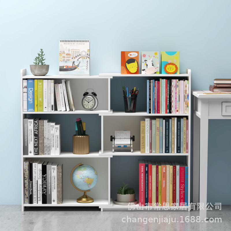 A modern, simple, child-to-child collection of simple bookstores by corner of the wall with a living room set up on the shelf.