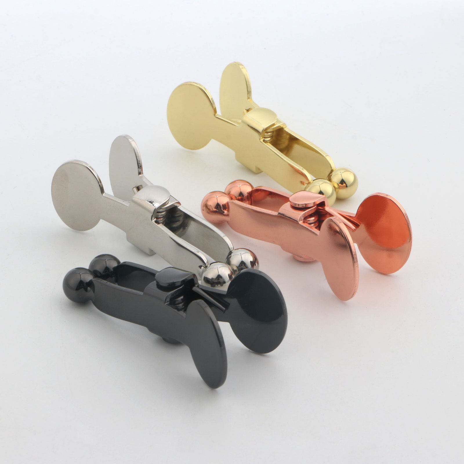 A metallic round-head clip with a simple, practical hand-to-peer creative-style game general kit