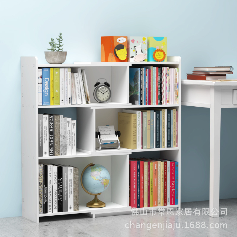 A modern, simple, child-to-child collection of simple bookstores by corner of the wall with a living room set up on the shelf.