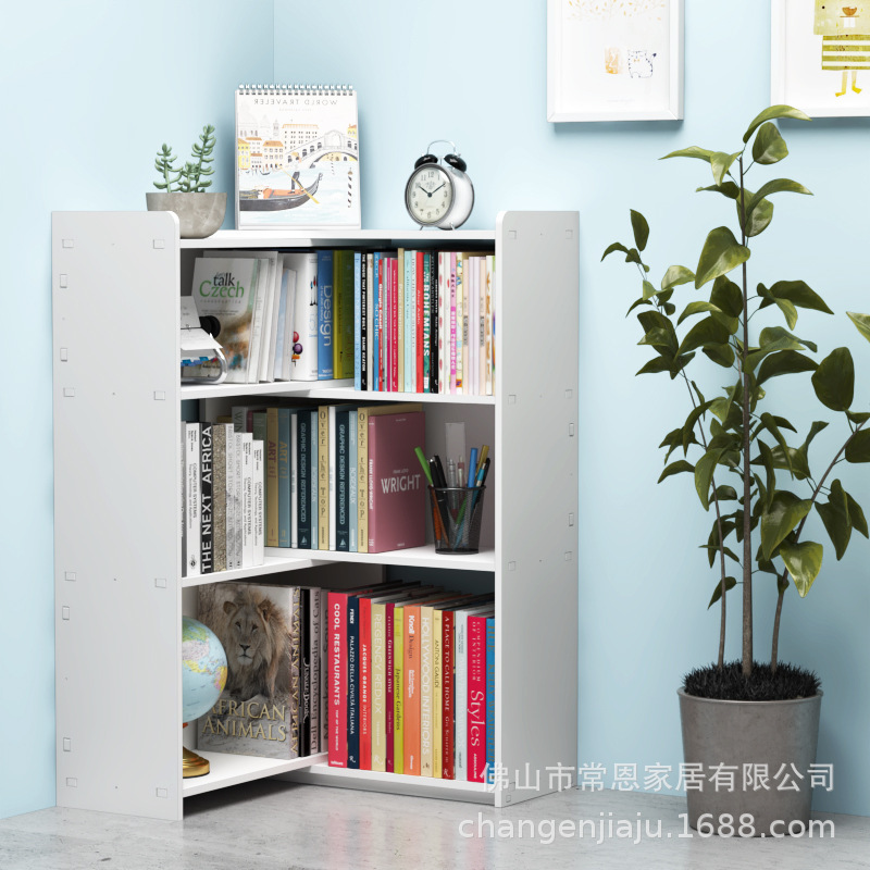 A modern, simple, child-to-child collection of simple bookstores by corner of the wall with a living room set up on the shelf.