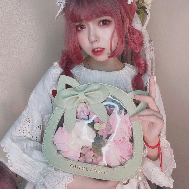 The original Lolita women's purse is a second degree student with a cute hand-in-hand slash.