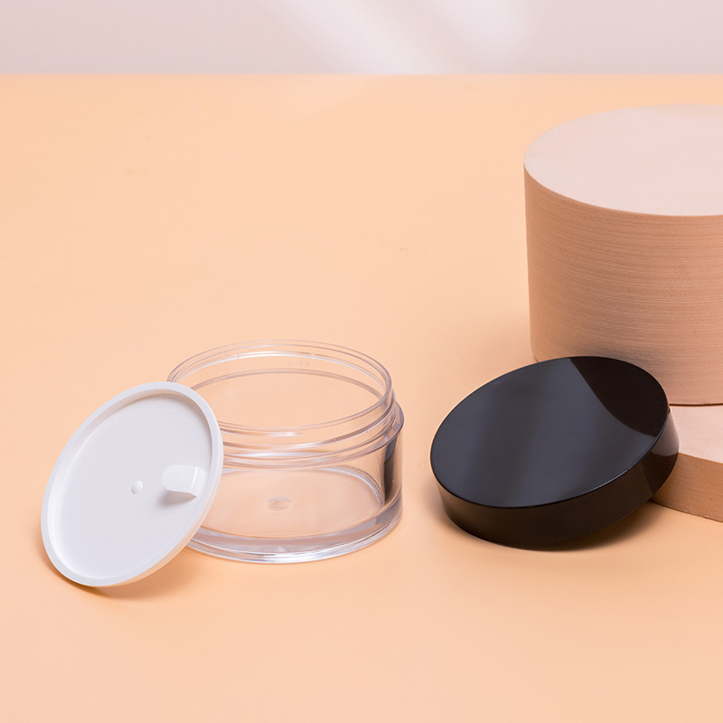 Hộp hóa trang bánh ngọt, và du lịch với một loại kem bột và một chai với một cái nắp áo ABS để kéo một chai kem.