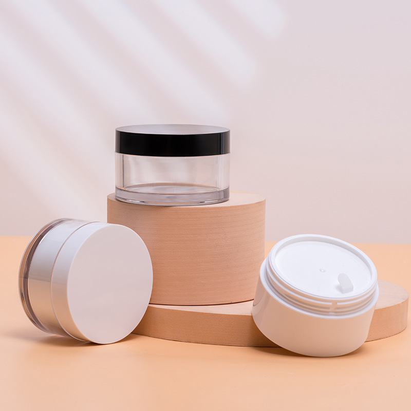 Hộp hóa trang bánh ngọt, và du lịch với một loại kem bột và một chai với một cái nắp áo ABS để kéo một chai kem.