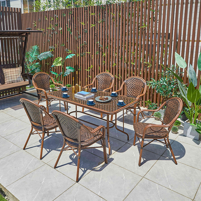 A table and a chair outside the garden garden, a table and a chair on the balcony.