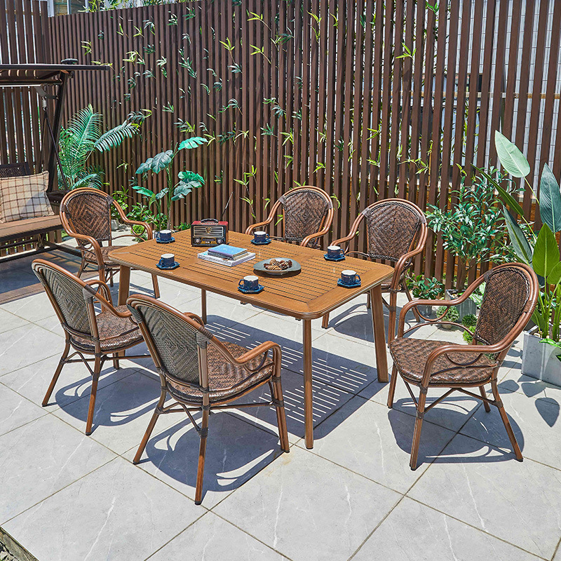 A table and a chair outside the garden garden, a table and a chair on the balcony.