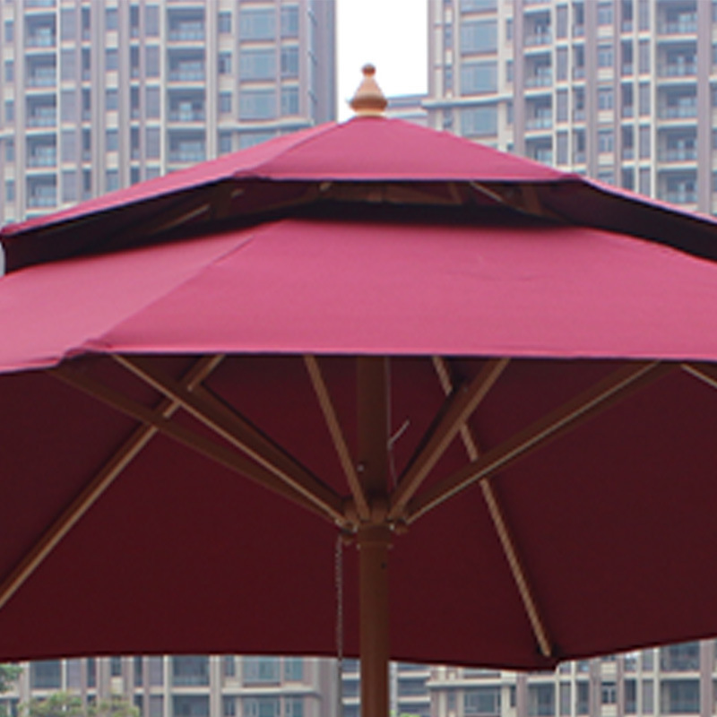 Two-caps of a wooden umbrella courtyard, thickened by an eight-bone commercial umbrella stand to block the distribution of an outdoor umbrella.