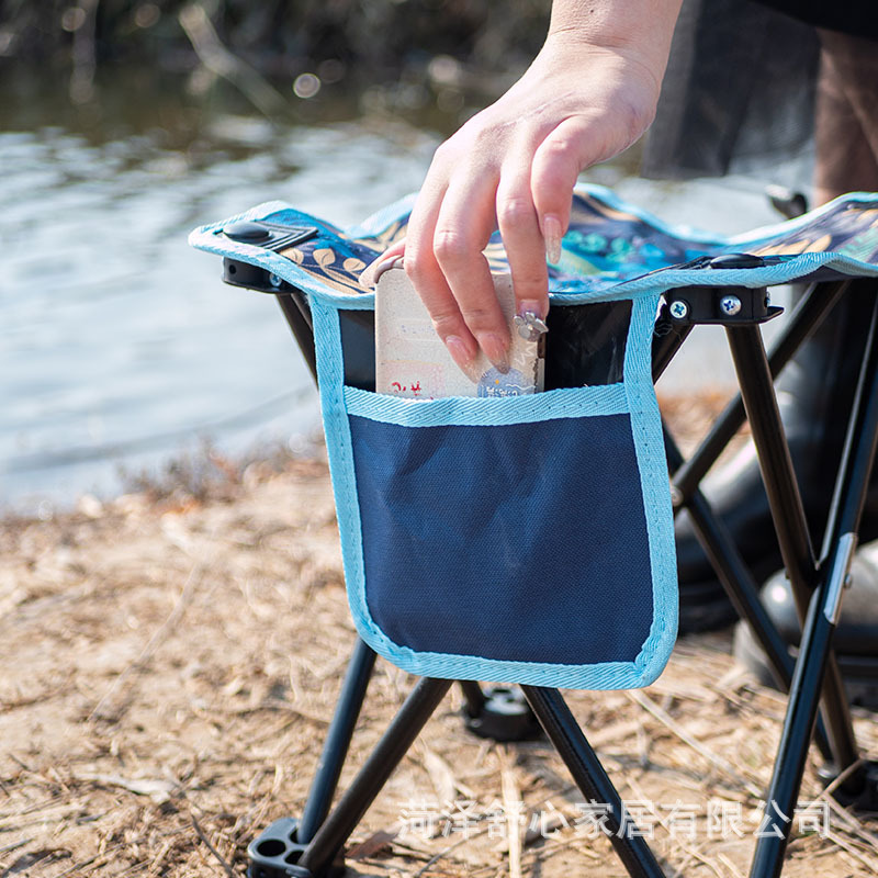 An outdoor portable folding chair doesn't have the back to catch a small chair with an Oxford folding stool.