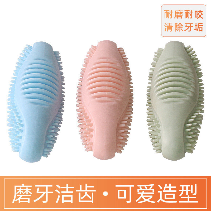 Một con chó với một con chó bị chứng khó đọc, một con chó được huấn luyện để bú bàn chải đồ chơi.