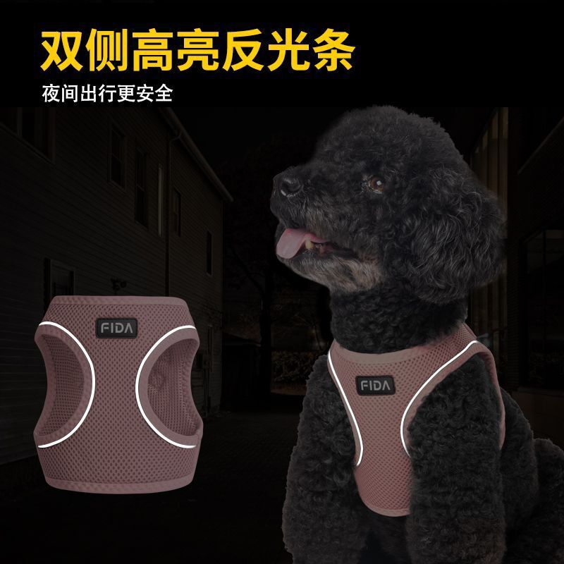 A pet with a vest on his chest and a turd on his back.