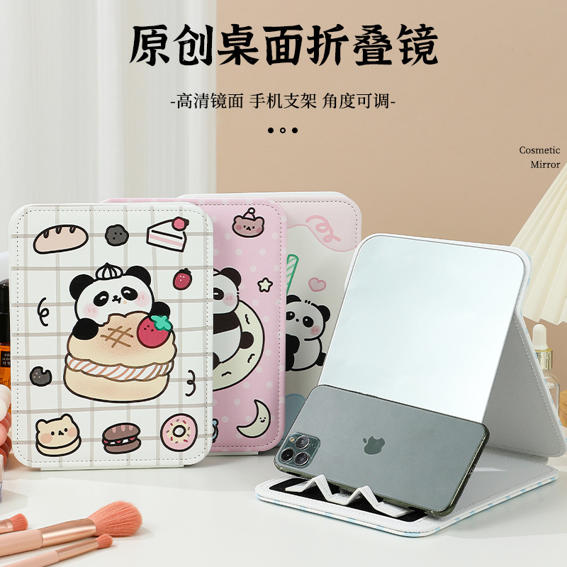 Cái giá điện thoại di động gấp cái bàn sinh viên đáng yêu với những tấm gương sạch dựa trên nhà.