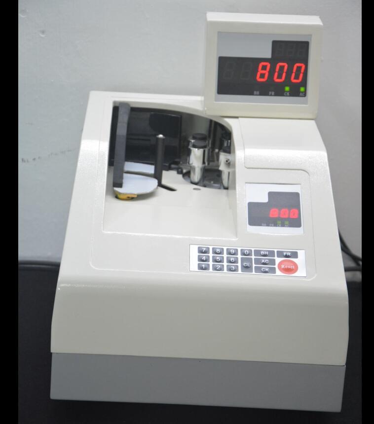 The manufacturer's counter is a vacum-point money machine, a global currency desktop vacuum fast-dry machine.