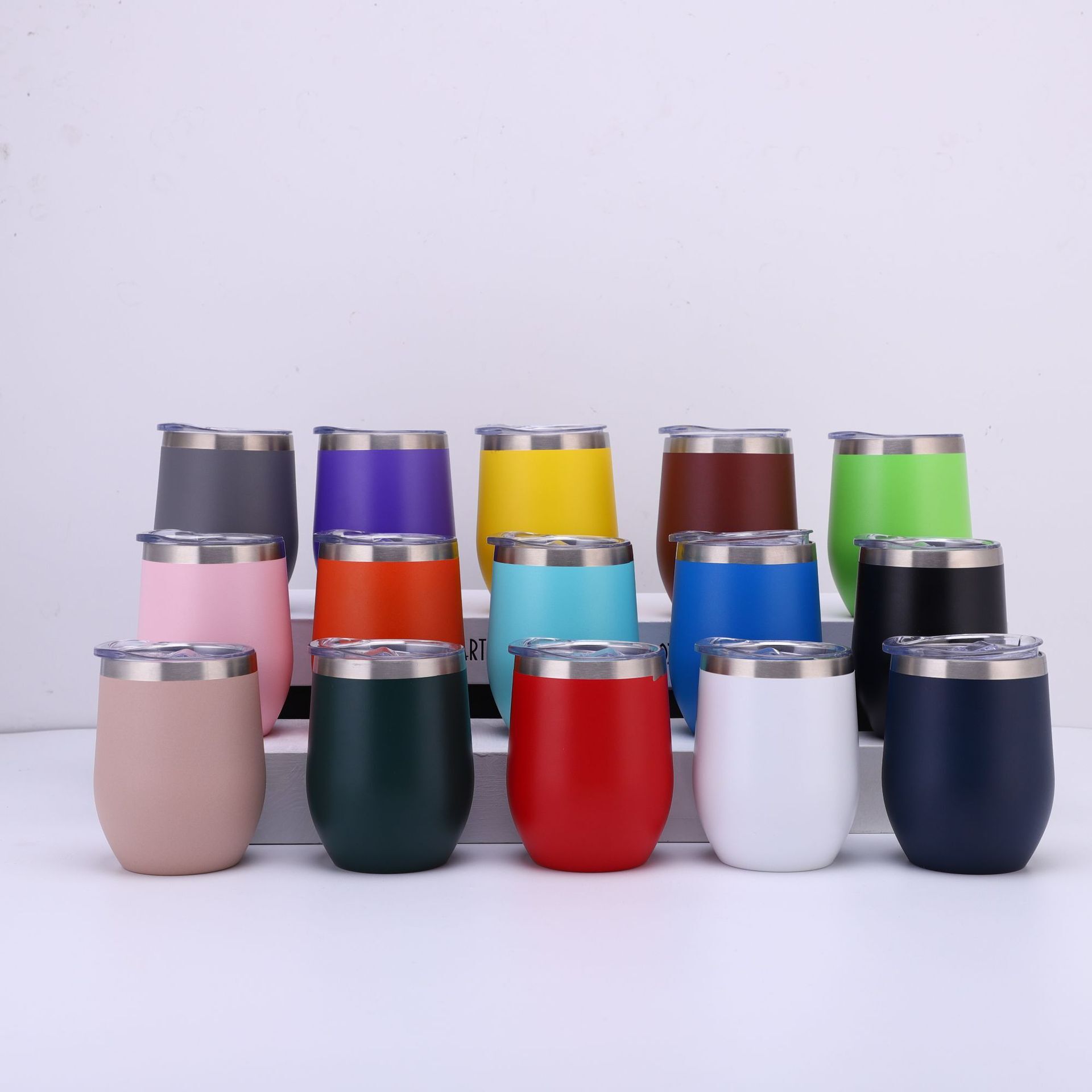 Sprayed eggshell cups, stainless steel red beer vacuums, and an egg 12oz.