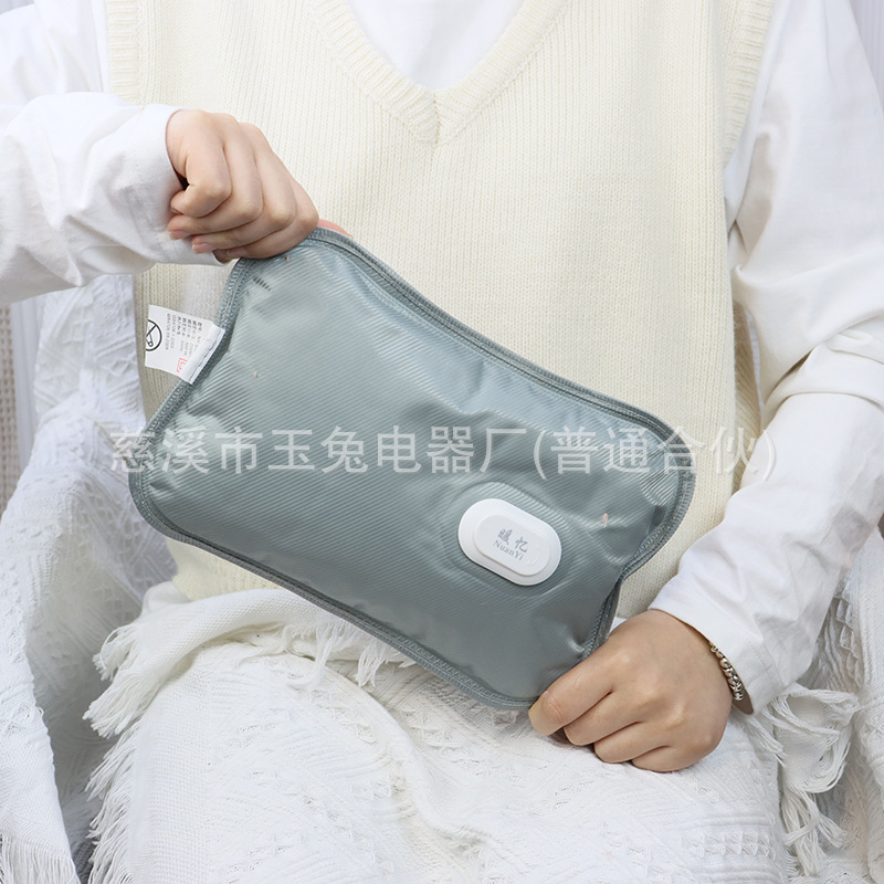 The mass silk-hot handbag of the warm memory factory delivers blast-proof, safe, warm feet charged with hot water bags.