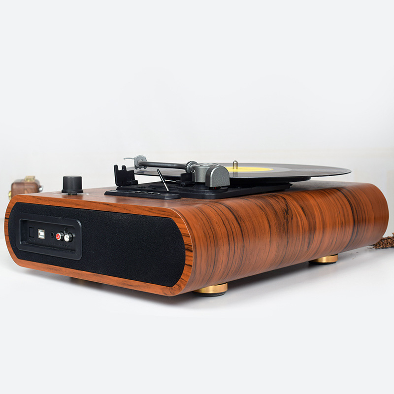 Multi-purpose black tape recorder phonographs with speaker-charging and hand-held bluetooth slots