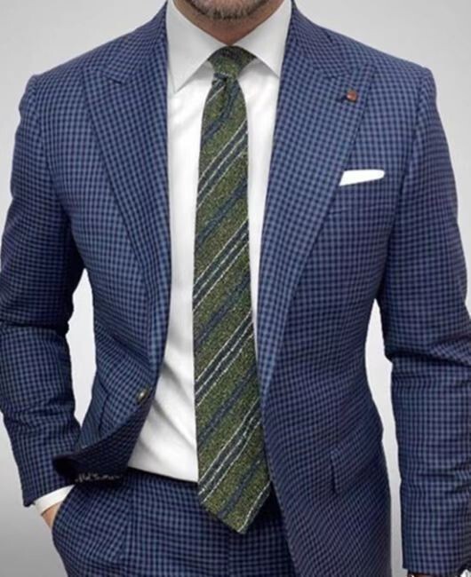 We've got a new, new, spring-and-crunch-of-the-mill man's suit tattooed over his long sleeve suit.