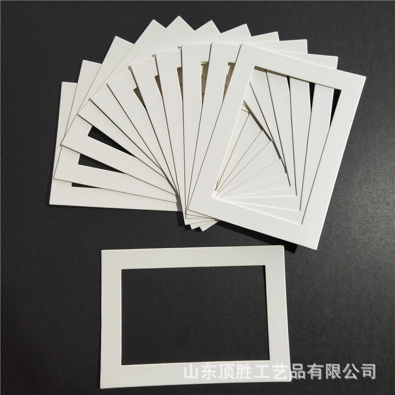 Paper liner inside the card frame, paper liner within the card frame.