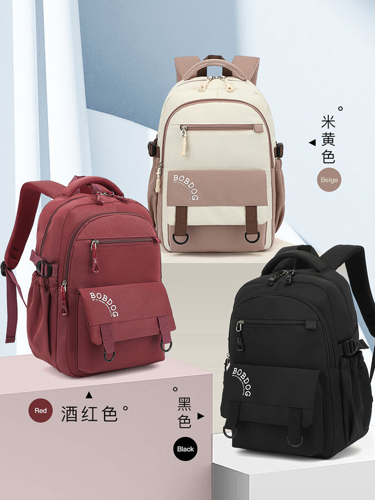 Babou-students gói với một khối lượng lớn ánh sáng, và hai chân bánh bao và một ba lô màu sắc tinh khiết cho trường trung học.