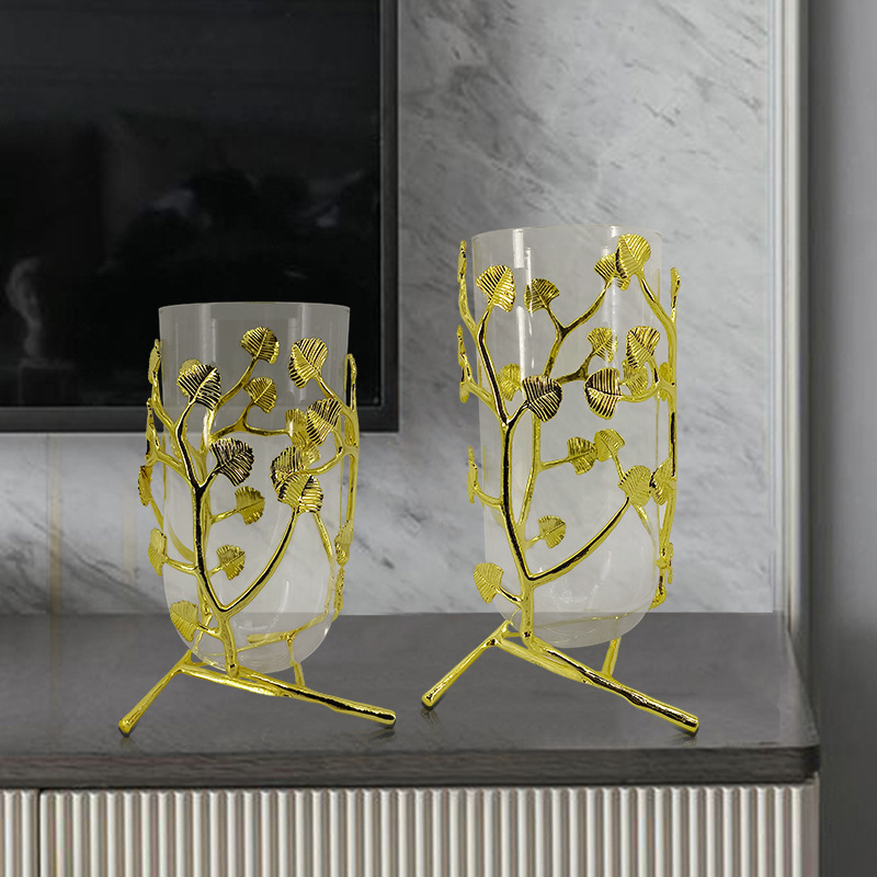 A vase set in the luxurious vase room with a bouquet of modern home-based soft decorations.