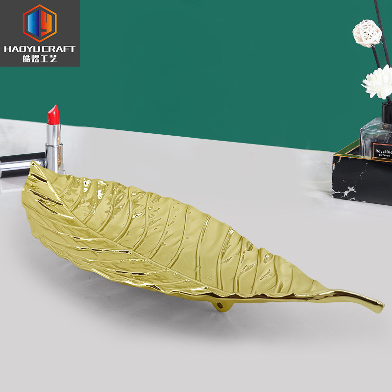 Stereo-Zinc alloy leaf cake displays a gold-ferrous metallic pastry tray creative desktop snack