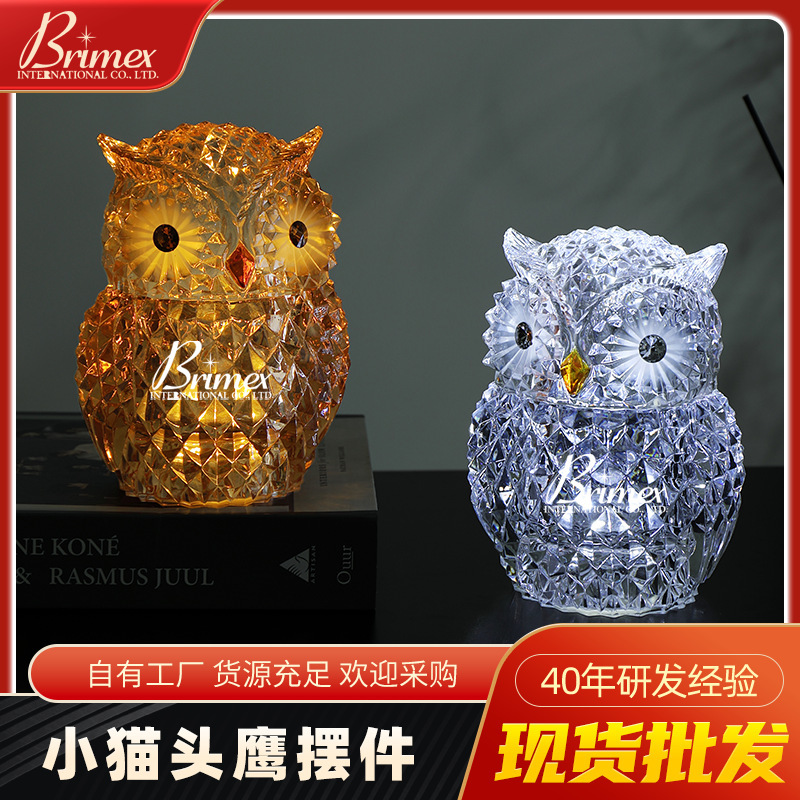 An owl with an optical crystal birthday gift home-based ember.