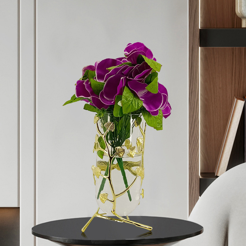 A vase set in the luxurious vase room with a bouquet of modern home-based soft decorations.