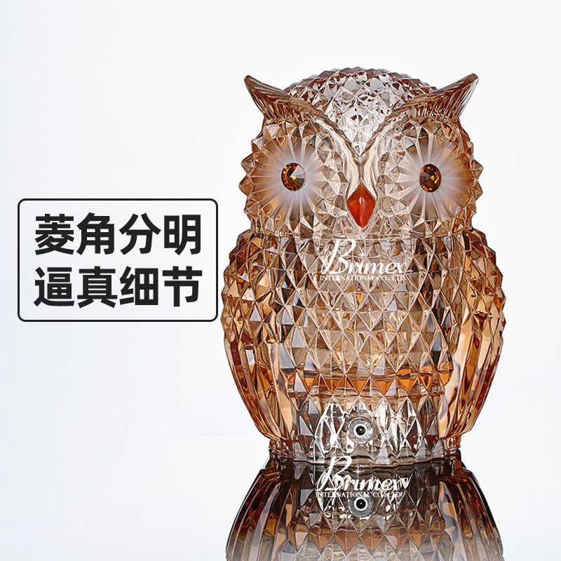 An owl with an optical crystal birthday gift home-based ember.