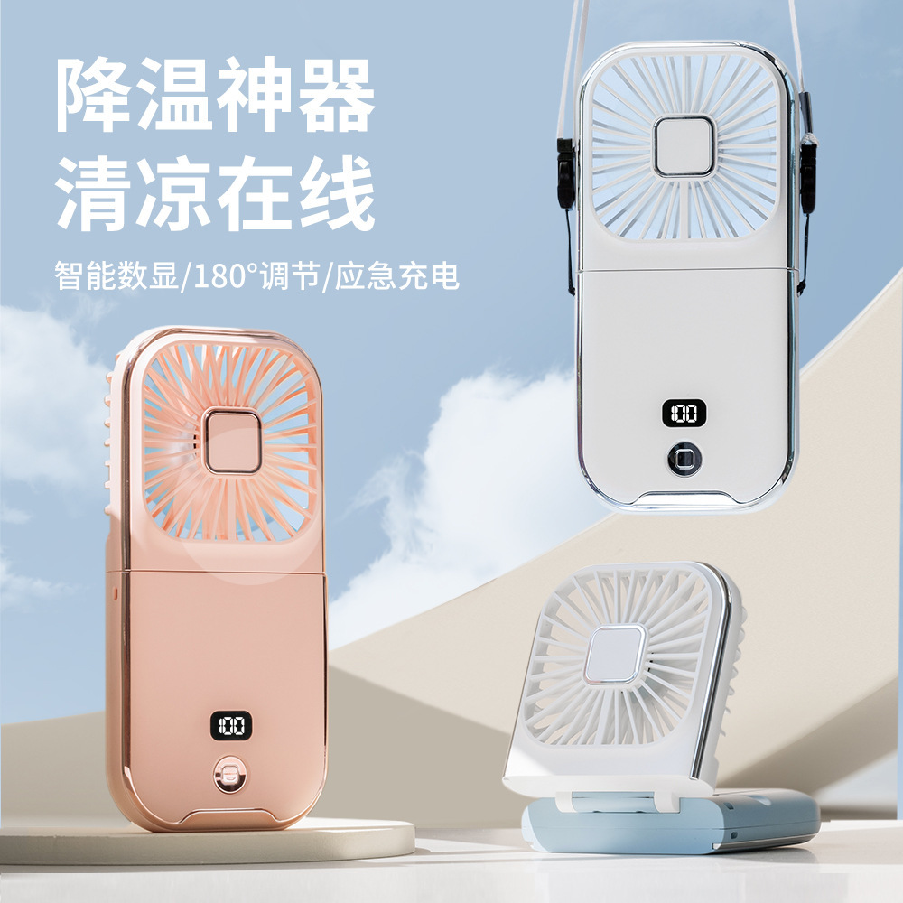 Một chiếc quạt xuyên biên giới mới với một chiếc quạt nhỏ để bàn và một chiếc quạt mini có thể gấp lại lớn.