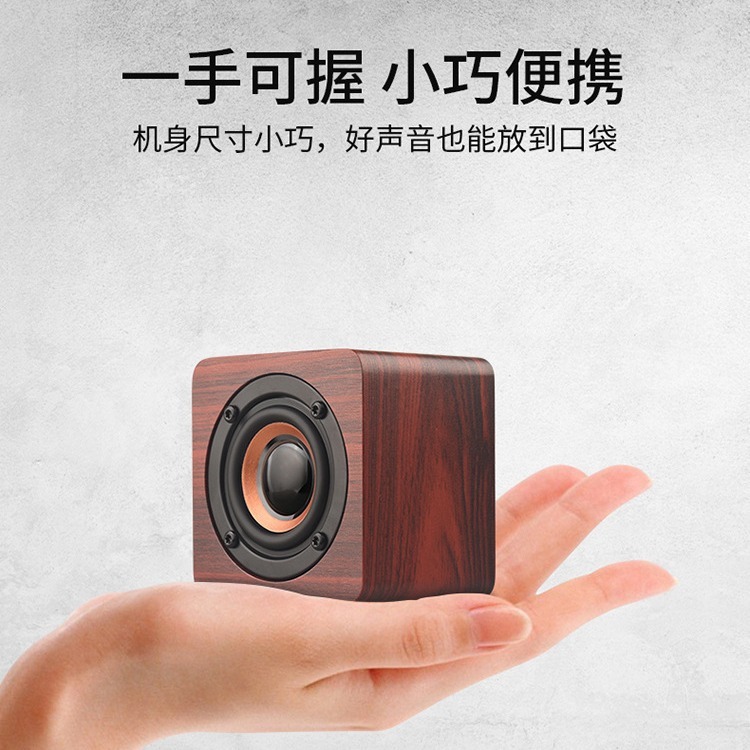 Điện thoại di động bằng gỗ, súng đại bác bass, logo, và dàn âm thanh điện tử điện tử sáng tạo.