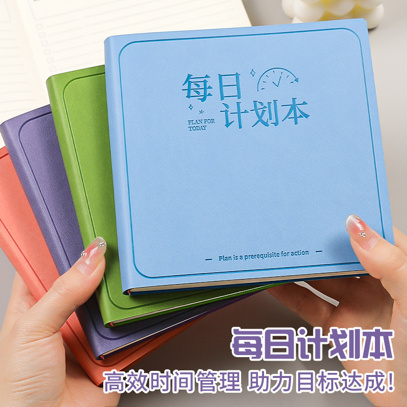 Kế hoạch hàng ngày chạy một tạp chí đánh thẻ bằng một cuốn sách slide.