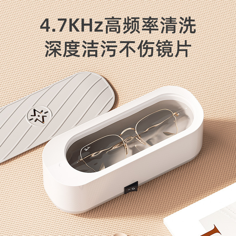 Một máy quét siêu âm với ống kính làm sạch.