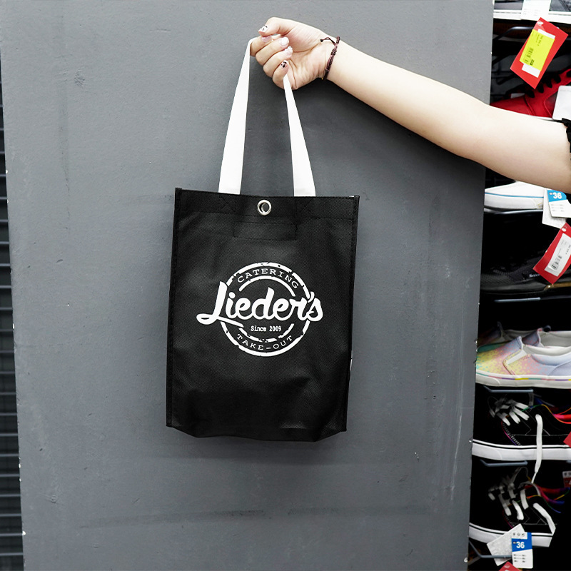Customized white handbags with a side of a general-container zipper.