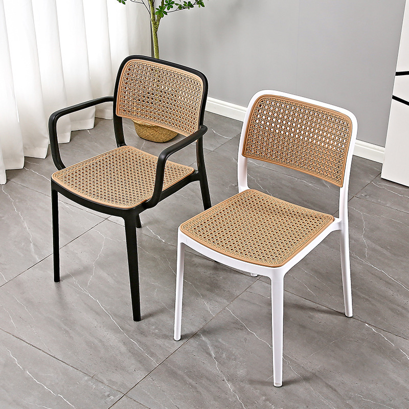 The Nordic plastic chair is used outside the house in a folded dining chair net, in the back of a small household desk and desk.