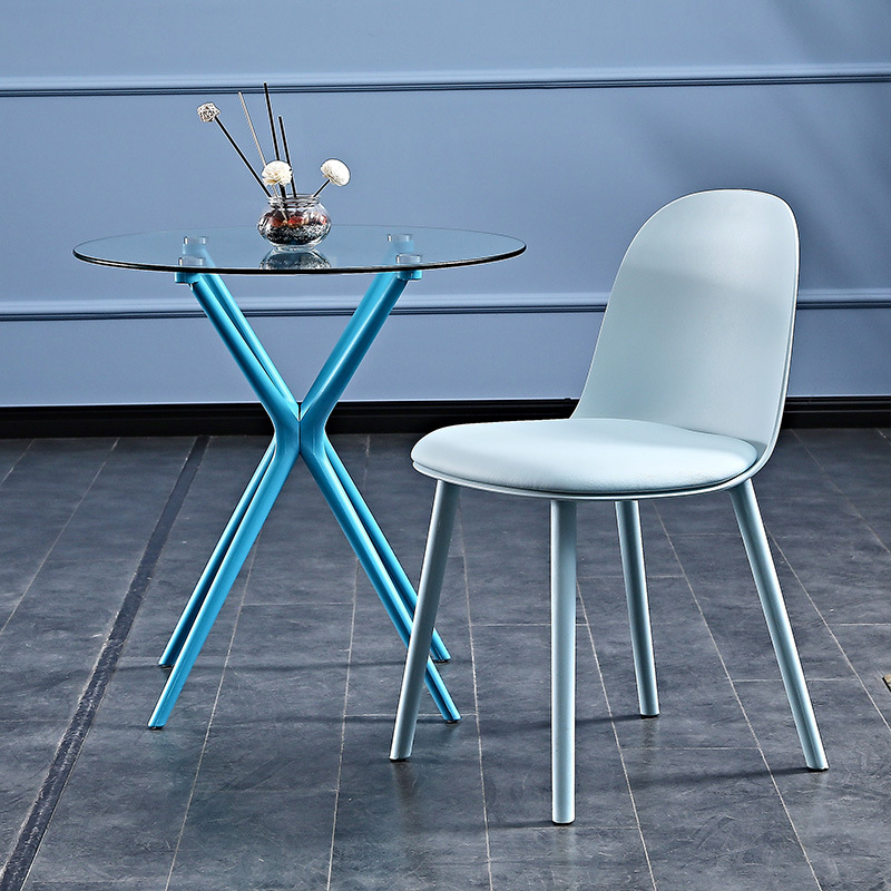 Outdoor rest table, glass and plastic room outside the open courtyard with a bench table outside the coffee shop.