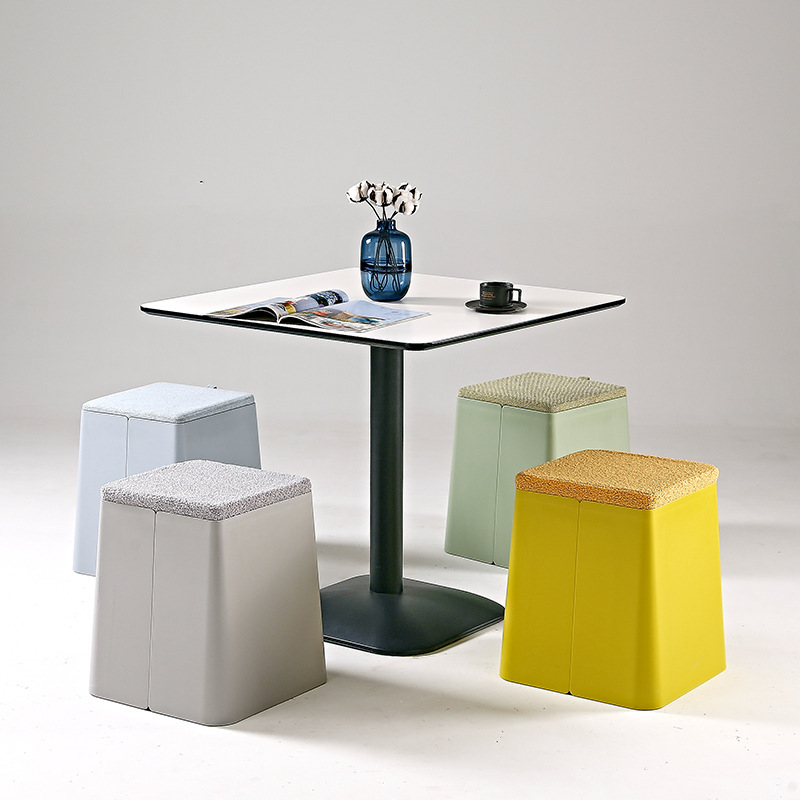 A small sitting in a red-hot restaurant with a mobile stool for modern plastic stool multifunctional storage.