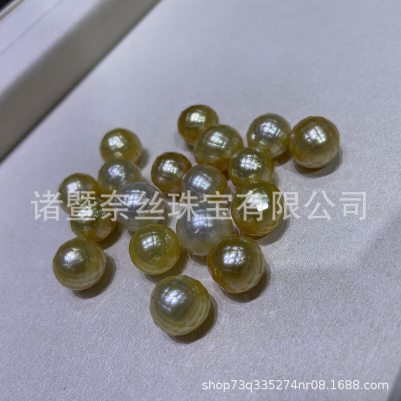 批發南洋金珠海水華珍珠深金11-12mm鑽石切割正圓強光微微瑕裸珠