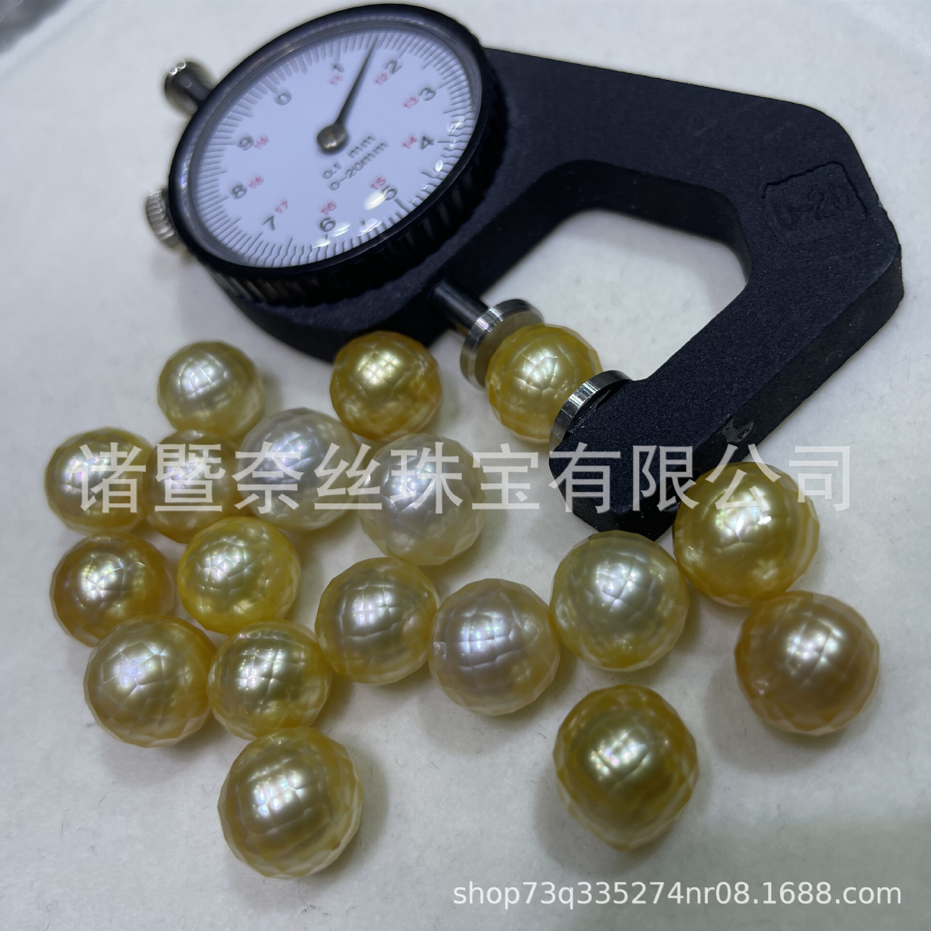 批發南洋金珠海水華珍珠深金11-12mm鑽石切割正圓強光微微瑕裸珠