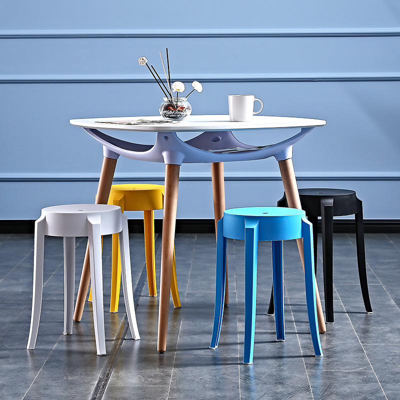 A plastic bench with a thick home table bench, a modern windmill bench, can be folded into a rounded chair for commercial purposes.