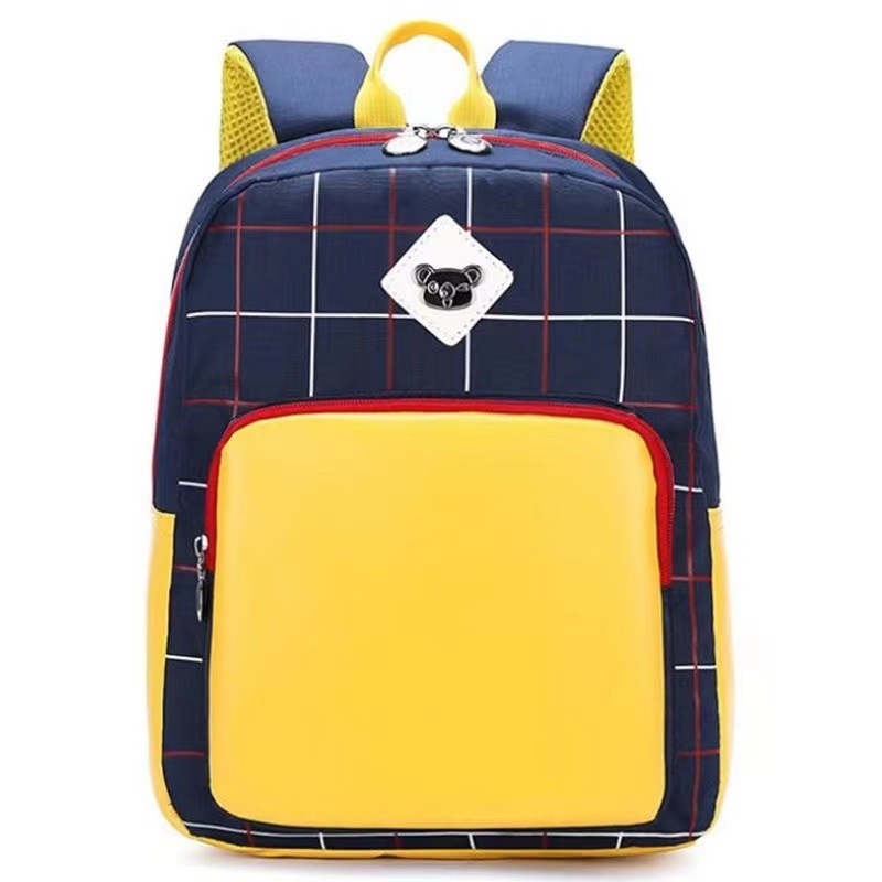 Wholesale delivery of the dyslexic-resisting school bag for primary-school students with a large capacity of water-proof kindergartens