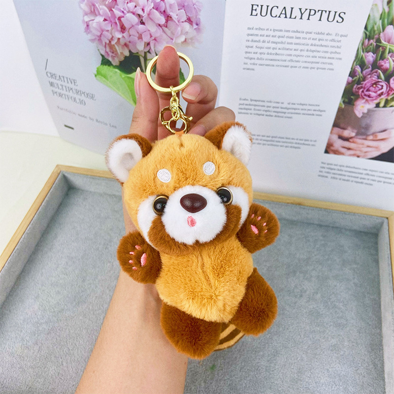 The original cute little panda velvet key buttoned off an interesting little gift from a doll around the zoo.