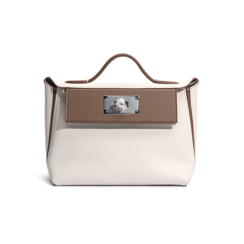 "H's original hand-sewn wax liner, Eve Swift skin, 2424 Kelly's one-shoulder-slashed leather bag."